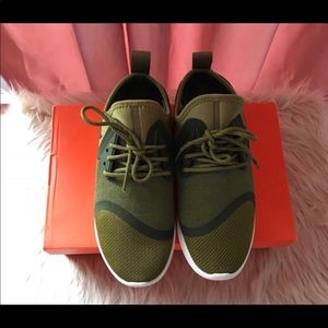 Olive green slim fit Nike lunarcharge shoes.